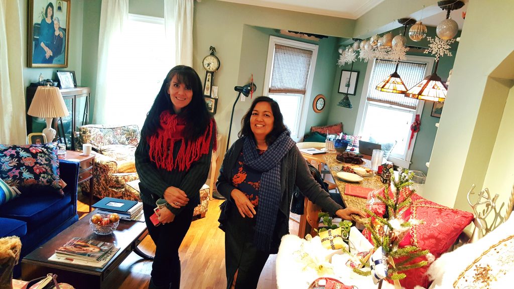 Friends Leanne Venier and Meeta Morrison hanging out by the Winter White Wonderland display m daughter styled.