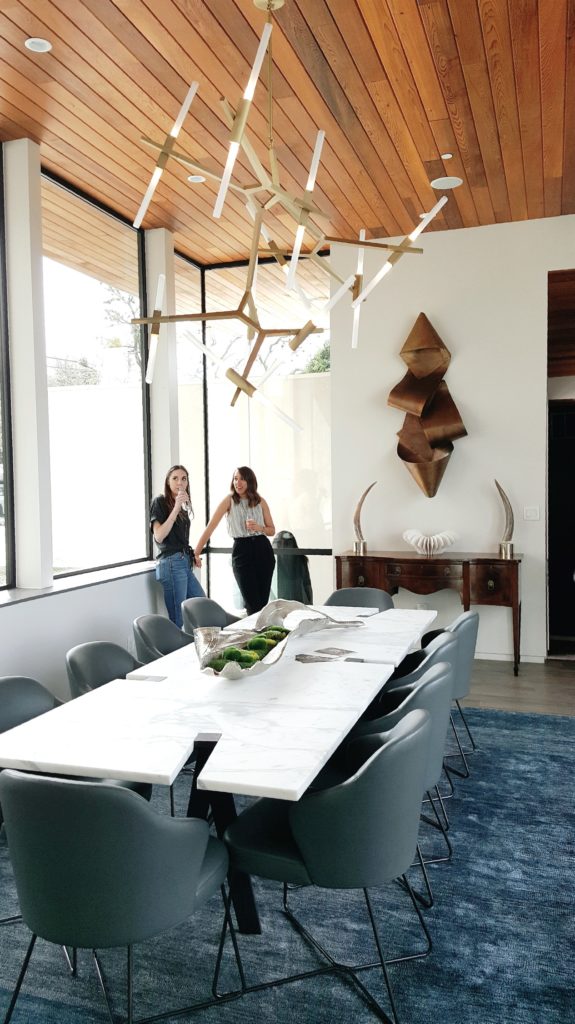 Striking modern chandeliers on The Austin Modern Home Tour. Check out The Pillow Goddess blog for more!