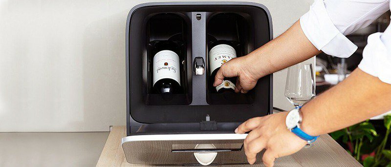 Plum automatic wine dispenser holds two bottles