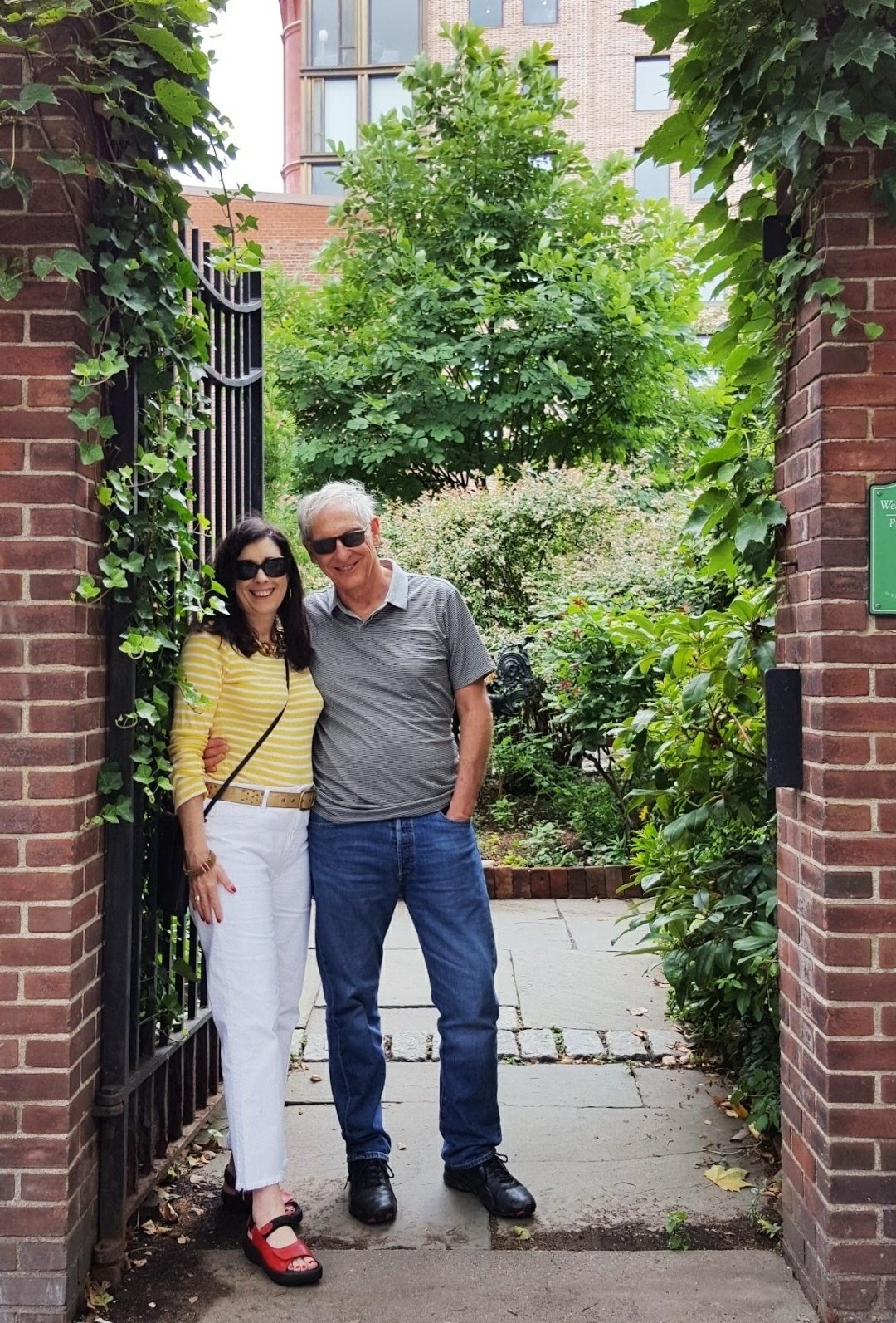 Deborah Main and her husband at the intimate gardens, West Village, NYC