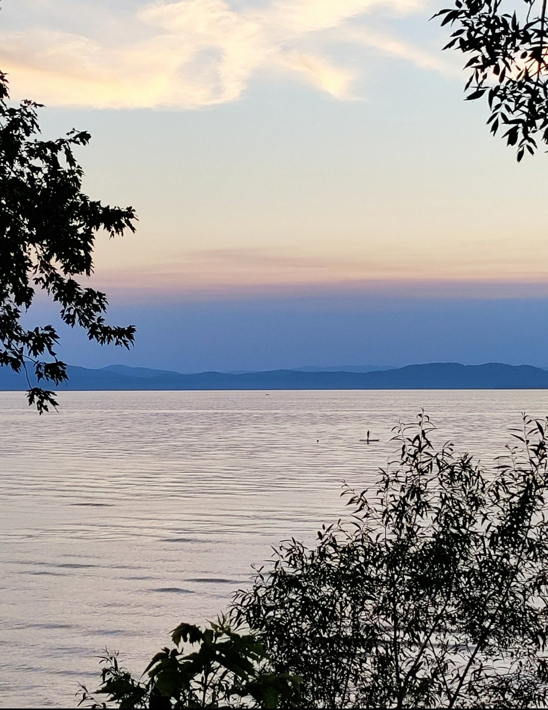 Sunset view of the Adirondack Mountains on Lake Champlain in Burlington, Vermont