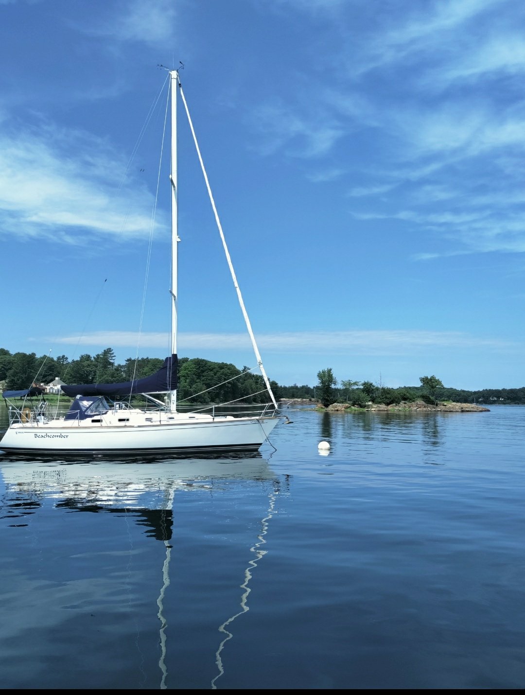 A Boat's reflection on Lake Champlain