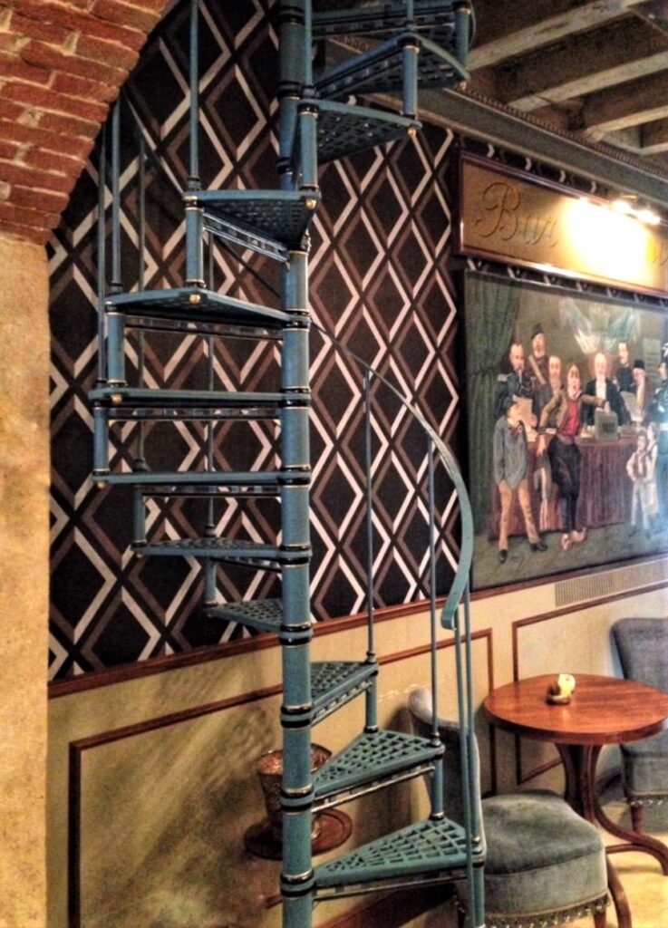 Historic staircase at Cafe Carducci.